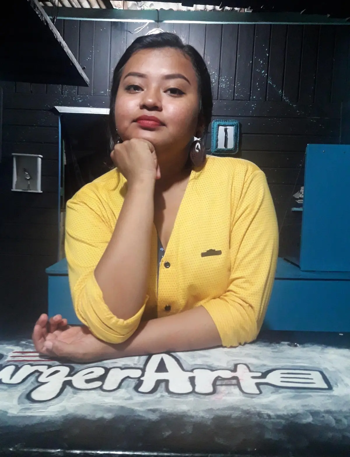 Raissa at the burger shop in Parintins